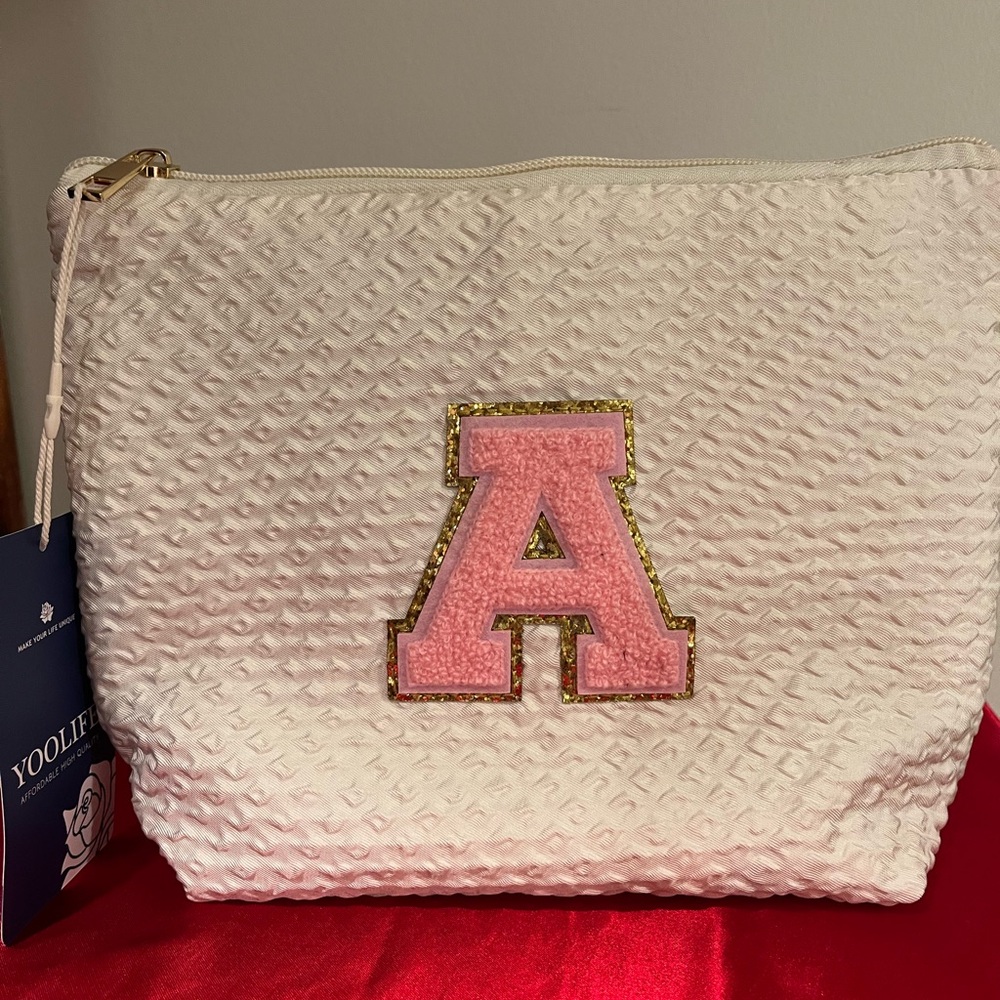 Cream Costmetic /Make up Bag with Pink letter “A” initial.